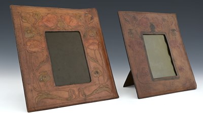 Lot 89 - Two Arts and Crafts embossed leather photo...