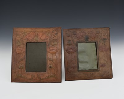Lot 89 - Two Arts and Crafts embossed leather photo...
