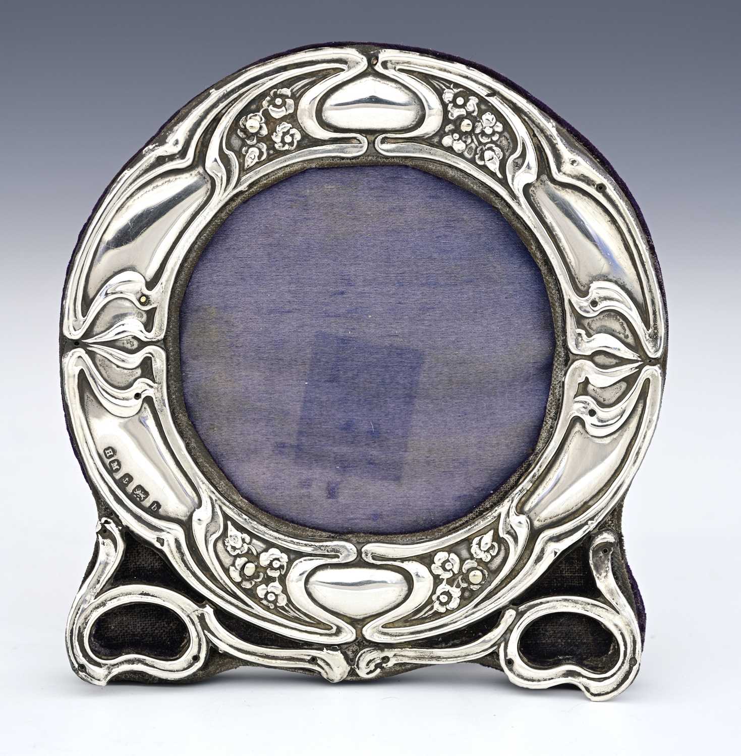 Lot 59 - An Arts and Crafts silver photo frame, Henry...