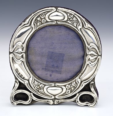 Lot 59 - An Arts and Crafts silver photo frame, Henry...