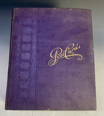 Lot 298 - A postcard album dating from the early 20th...