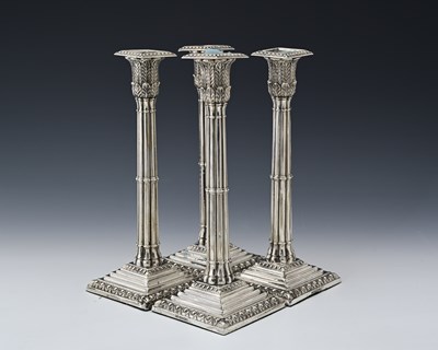 Lot 109 - A set of four Victorian silver candlesticks,...