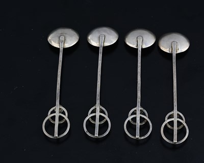 Lot 63 - Four Arts and Crafts silver and gem set spoons,...