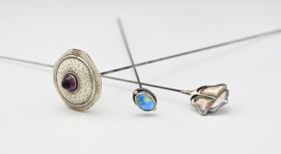 Lot 58 - Three Arts and Crafts hat pins, including a...
