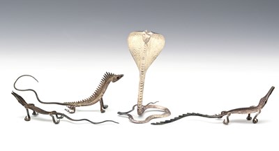 Lot 48 - Four novelty Indian white metal menu holders,...