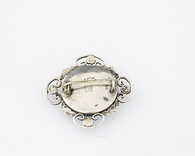 Lot 20 - Henry William King, an Arts and Crafts silver...