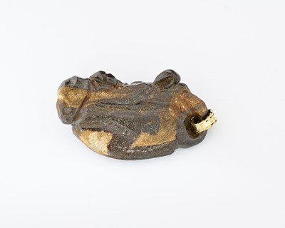 Lot 27 - An Arts and Crafts carved boulder opal pendant,...