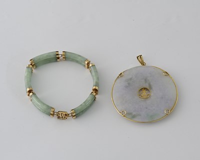 Lot 18 - A jade and gem-set pendant and bracelet