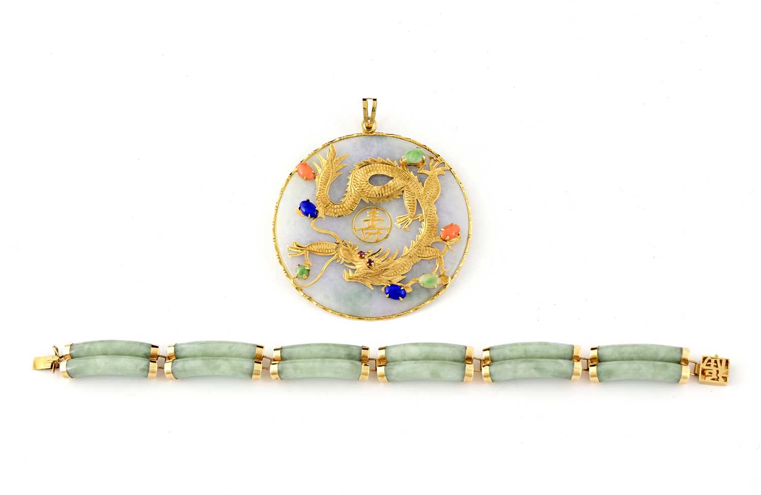 Lot 18 - A jade and gem-set pendant and bracelet