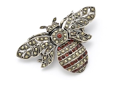 Lot 32 - An Art Deco silver, garnet and marcasite bee...