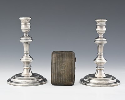 Lot 233 - A pair of Elizabeth II silver candlesticks, by...