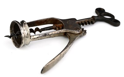 Lot 111 - A French single lever corkscrew, double pillar...