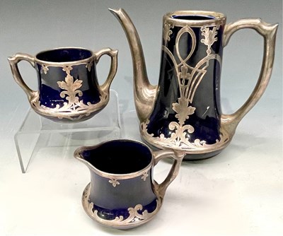 Lot 138 - An Art Nouveau three piece porcelain tea set,...