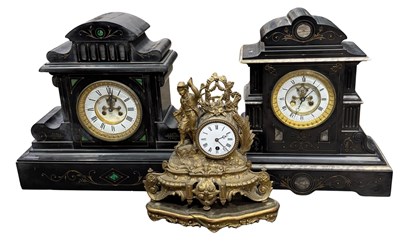 Lot 330 - A 19th century black slate clock, round...