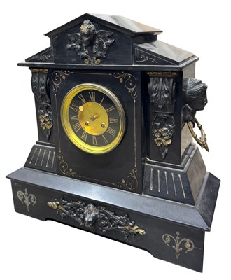 Lot 329 - A Victorian black marble or slate mantle clock,...