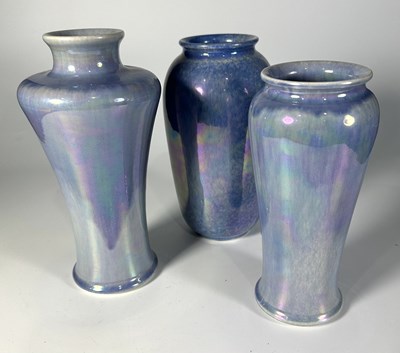 Lot 196 - Three blue lustre-glazed Ruskin vases of...