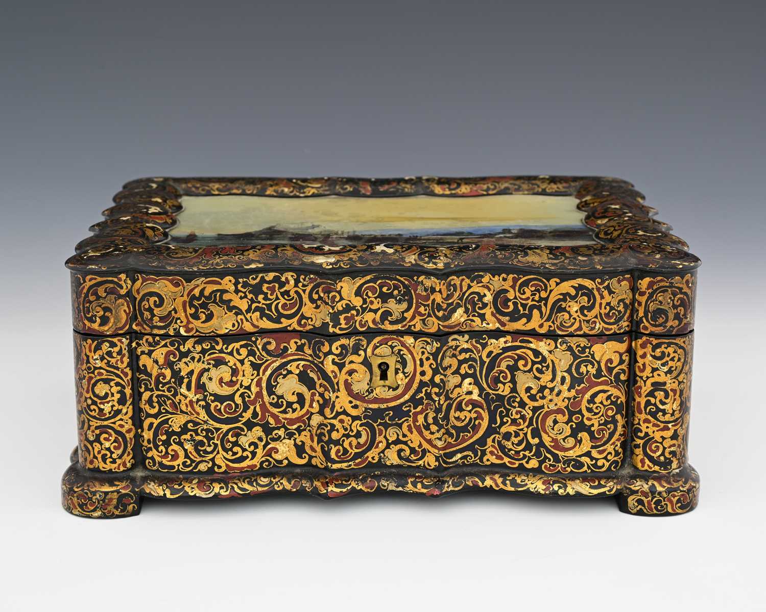Lot 106 - A Victorian Japanned lacquer and reverse...