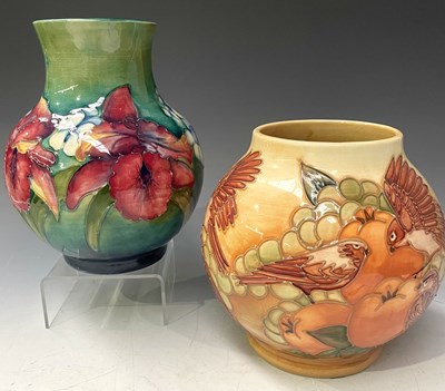 Lot 155 - A Moorcroft Orchid pattern vase, green ground,...