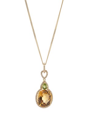 Lot 128 - An 18ct gold citrine, peridot and...