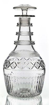 Lot 408 - An Irish triple ring neck glass decanter and...