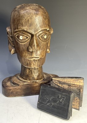Lot 240 - An Indonesian carved wooden head with inset...