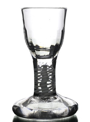 Lot 397 - An opaque twist toasting glass, circa 1760,...