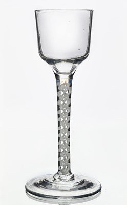 Lot 396 - An opaque twist wine glass, circa 1765, the...