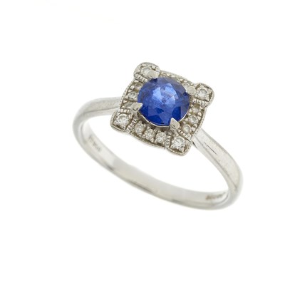 Lot 143 - A platinum sapphire and brilliant-cut diamond...