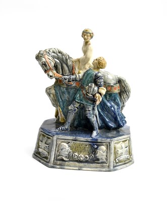 Lot 297 - A pottery Knight and Fair Maiden sculpture, in...