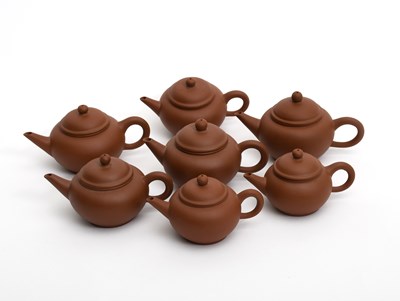Lot 357 - Seven Chinese small Yixing teapots and covers,...