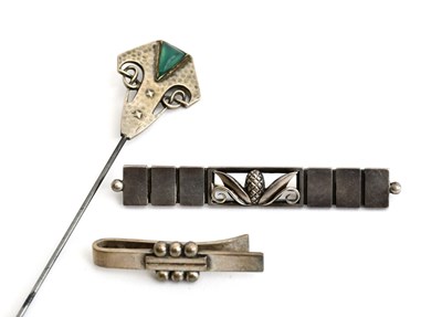 Lot 540 - A hammered silver hatpin, pierced and cast...