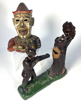 Lot 338 - A cast iron mechanical money box, modelled...