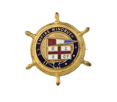 Lot 142 - S S Empire Windrush, an enamelled gilt metal...