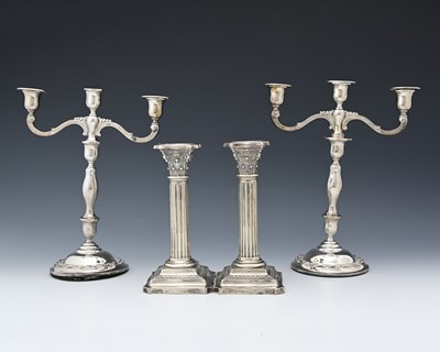 Lot 267 - A pair of twentieth-century silver candelabra,...