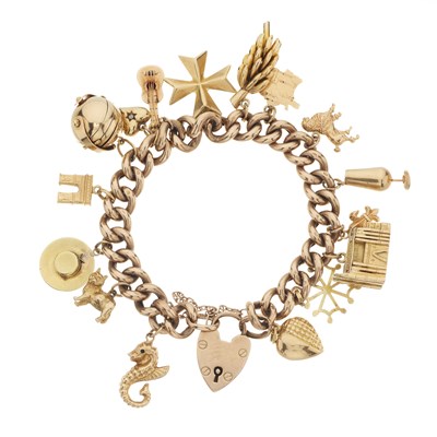 Lot 21 - A curb-link chain charm bracelet