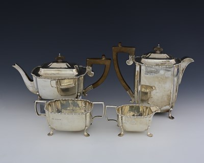 Lot 327 - A George V silver four-piece tea service, by J...