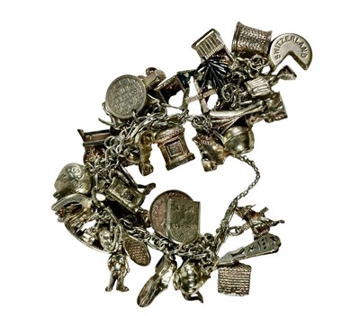 Lot 441 - A silver charm bracelet