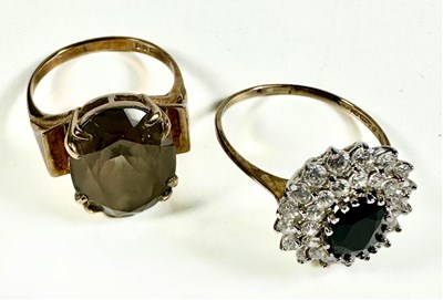 Lot 413 - Two 9ct gold gem set rings