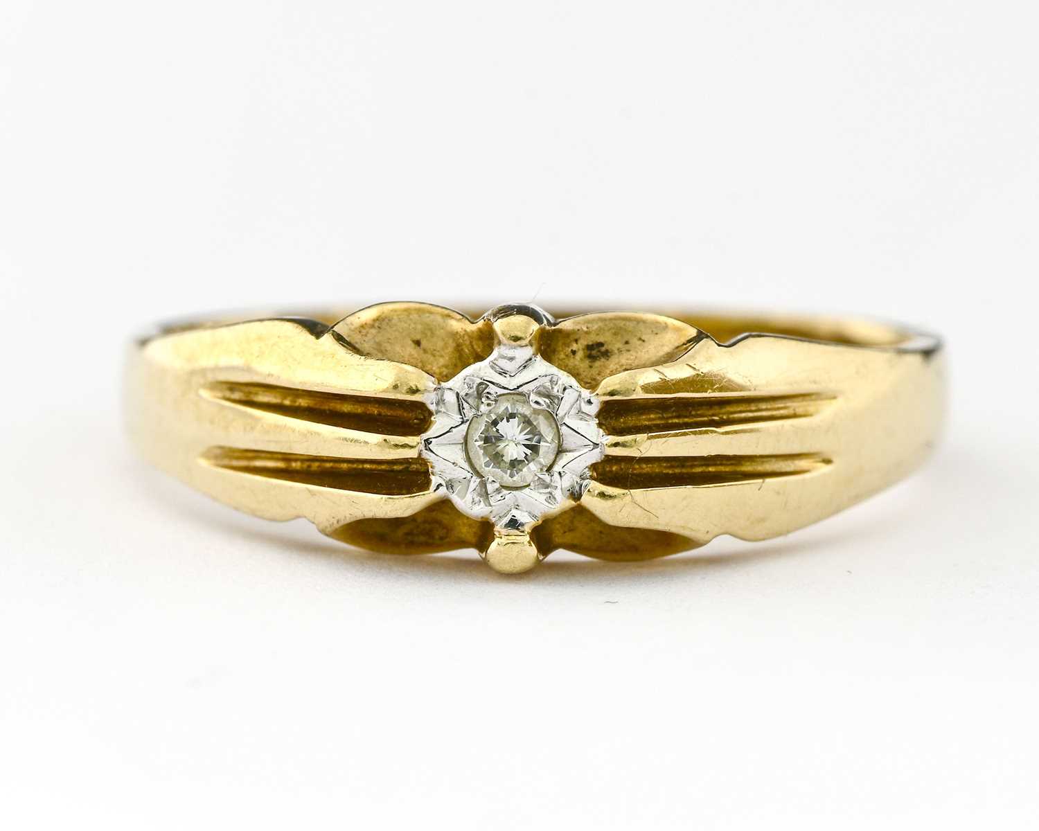 Lot 3 - A 9ct gold diamond ring