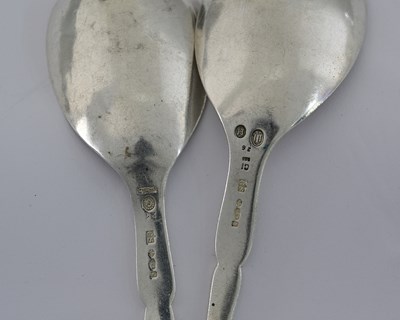 Lot 71 - Georg Jensen, two silver preserve spoons,...