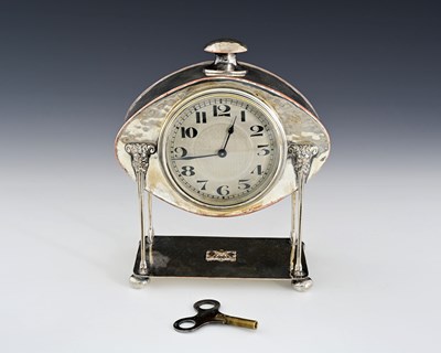 Lot 83 - A E Jones, an Arts and Crafts silver plated...