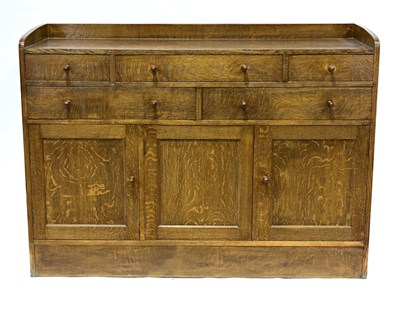 Lot 403 - A Heal's oak sideboard, rectangular section,...