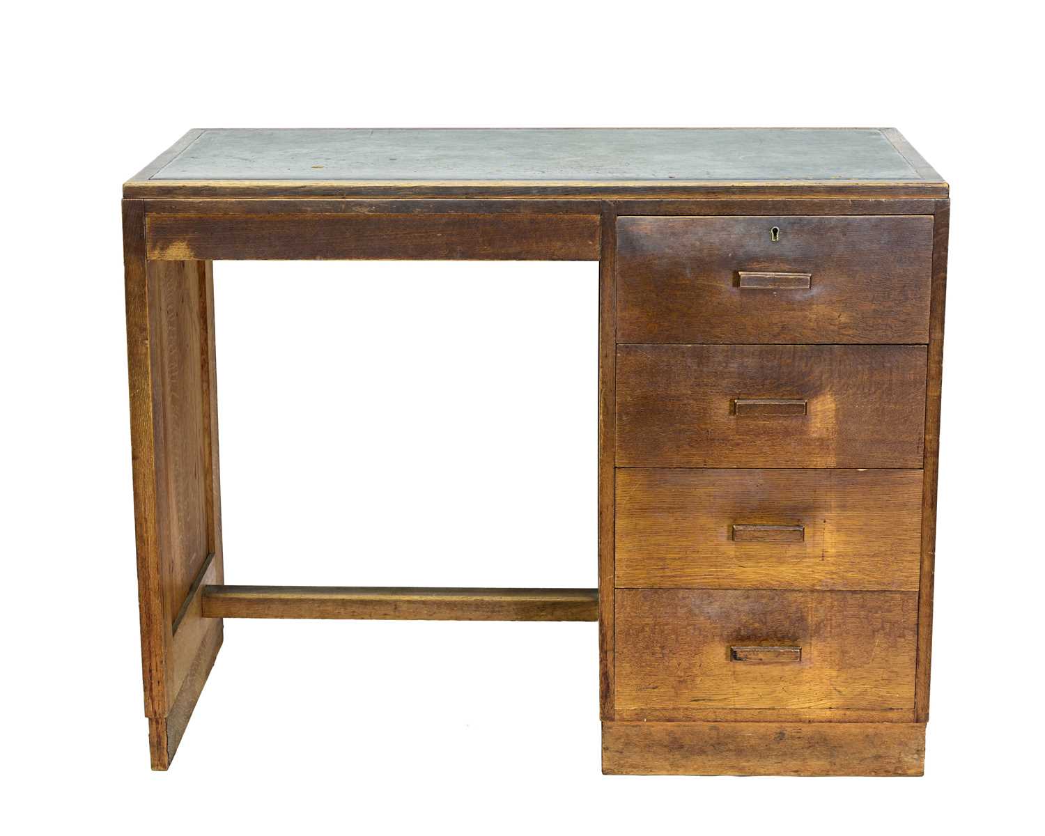Lot 69 - A Heal's oak students desk, rectangular top...