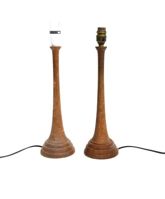 Lot 400 - A pair of oak table lamps in the manner of...