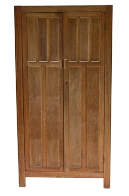 Lot 74 - A Kandya limed-wood double wardrobe,...