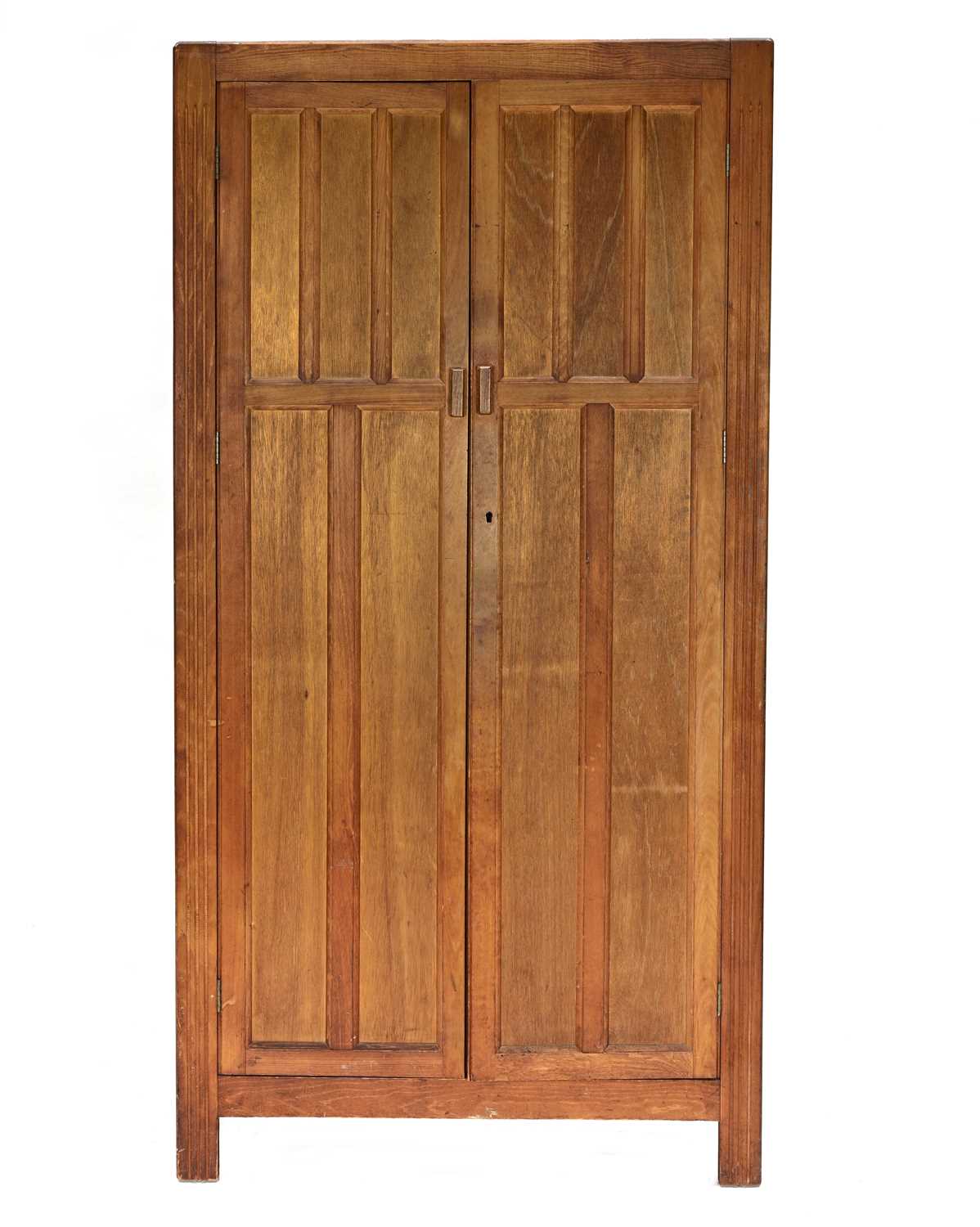 Lot 75 - A Kandya limed-wood double wardrobe,...