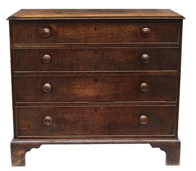 Lot 317 - A George III country oak chest of drawers,...