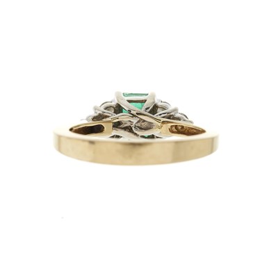 Lot 167 - A 14ct gold emerald dress ring, with brilliant-...