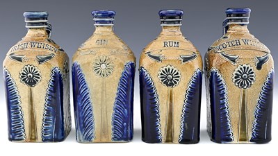 Lot 571 - C J C Bailey, Fulham, a set of four stoneware...