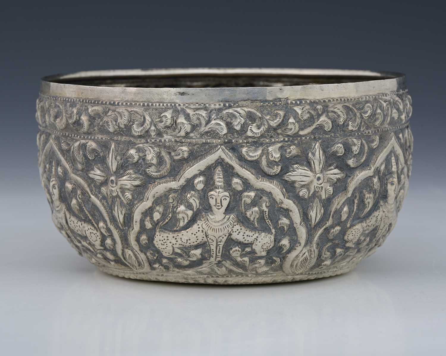 Lot 28 - An Eastern silver-coloured metal bowl,...
